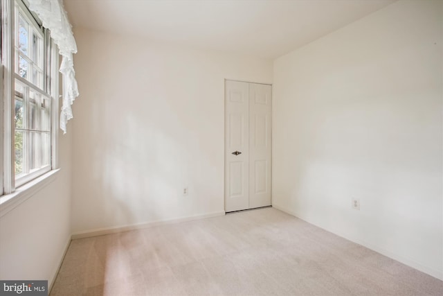 1881 Cold Creek Ct, Vienna, VA 22182 - carpeted empty room with baseboards