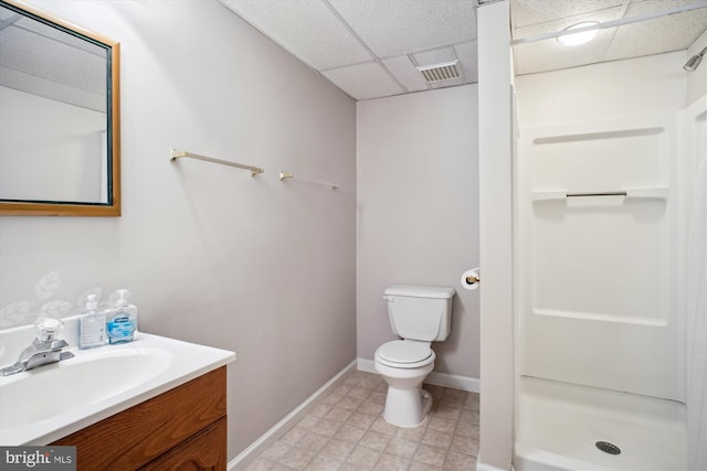 1881 Cold Creek Ct, Vienna, VA 22182 - bathroom featuring a paneled ceiling, a shower stall, vanity, toilet, and baseboards