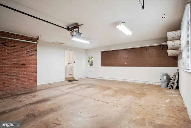1881 Cold Creek Ct, Vienna, VA 22182 - garage featuring washer / clothes dryer and a garage door opener