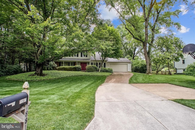 1881 Cold Creek Ct, Vienna, VA 22182 - traditional home featuring concrete driveway, a front yard, and an attached garage