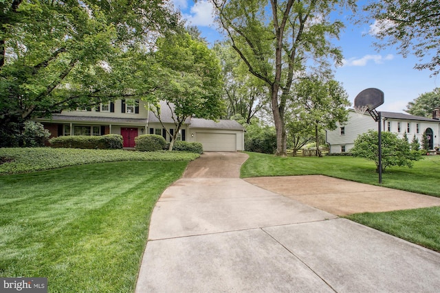 1881 Cold Creek Ct, Vienna, VA 22182 - view of front of property featuring concrete driveway, a front yard, and an attached garage