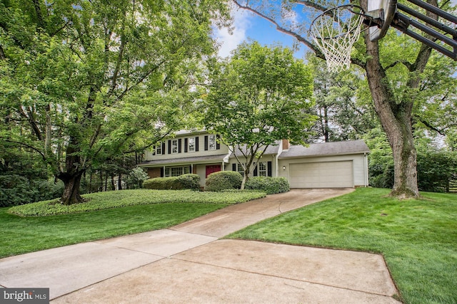1881 Cold Creek Ct, Vienna, VA 22182 - view of front of property with driveway, an attached garage, a front lawn, and a chimney
