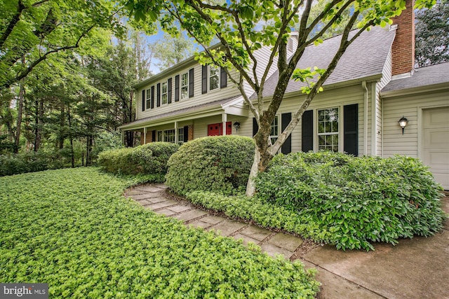 1881 Cold Creek Ct, Vienna, VA 22182 - view of front of property with a chimney and a garage