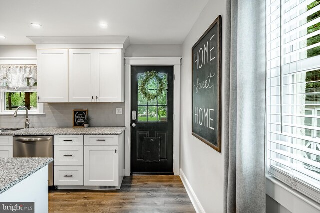 618 Ruth, Upper Chichester, PA 19014 - kitchen with dark wood-style flooring, white cabinets, backsplash, a sink, and recessed lighting
