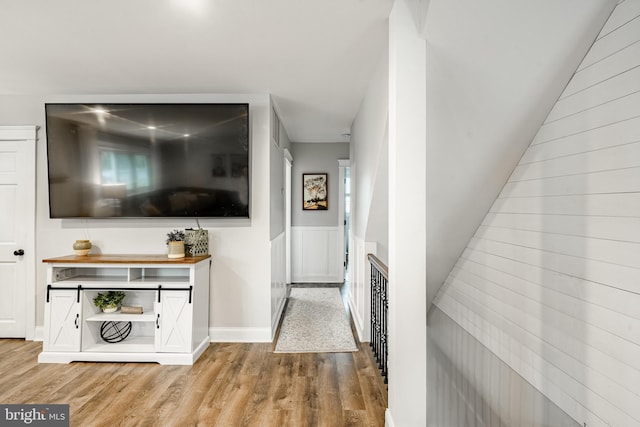 618 Ruth, Upper Chichester, PA 19014 - hall with light wood-style floors and wainscoting