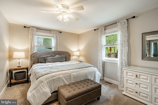 618 Ruth, Upper Chichester, PA 19014 - carpeted bedroom with multiple windows, baseboards, and ceiling fan