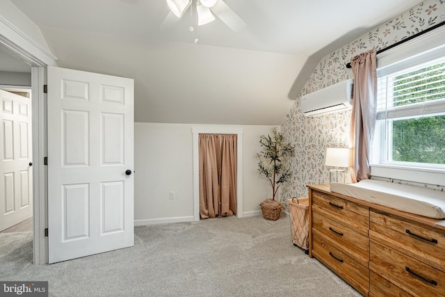 618 Ruth, Upper Chichester, PA 19014 - bedroom with a wall mounted air conditioner, vaulted ceiling, light colored carpet, baseboards, and ceiling fan