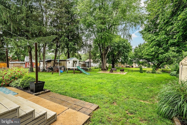 618 Ruth, Upper Chichester, PA 19014 - view of yard with a playground and a patio