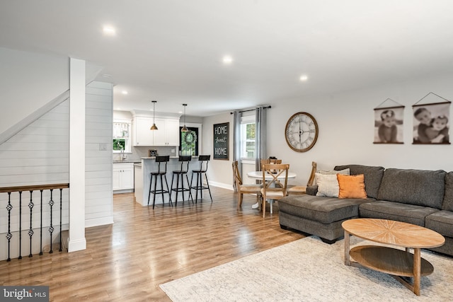 618 Ruth, Upper Chichester, PA 19014 - living room with light wood-type flooring, healthy amount of natural light, recessed lighting, and baseboards