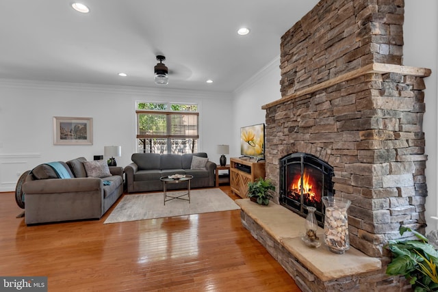 620 Cypress Ln, Severna Park, MD 21146 - living room featuring ornamental molding, a fireplace, light wood-style floors, and recessed lighting