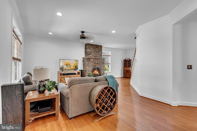 620 Cypress Ln, Severna Park, MD 21146 - living room with light wood finished floors, a fireplace, ornamental molding, and recessed lighting
