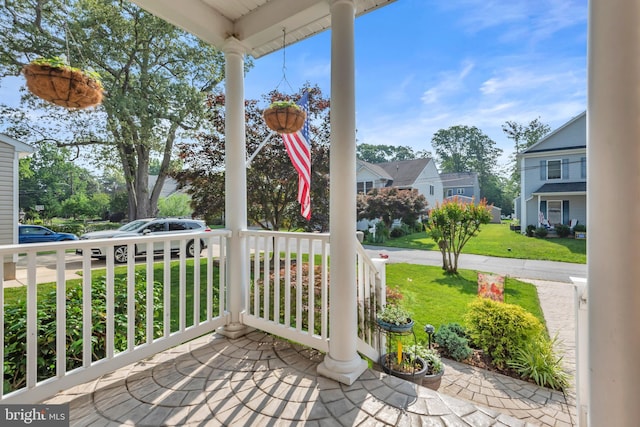 620 Cypress Ln, Severna Park, MD 21146 - porch featuring a residential view and a yard