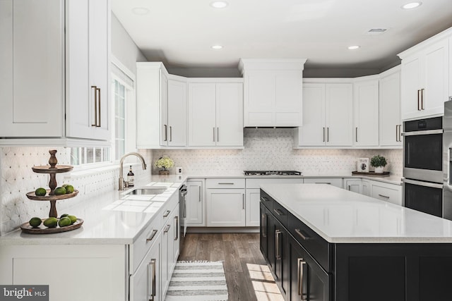 2638 Hollow View Dr, Easton, PA 18040 - kitchen featuring appliances with stainless steel finishes, dark cabinetry, light countertops, white cabinets, and recessed lighting