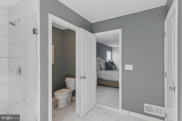 2638 Hollow View Dr, Easton, PA 18040 - ensuite bathroom featuring toilet, marble finish floors, a marble finish shower, and baseboards