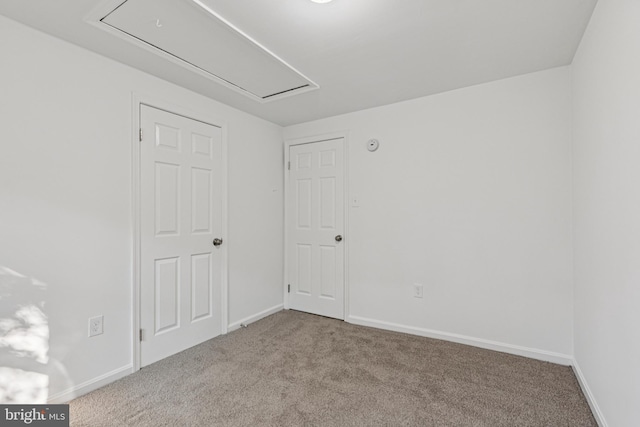 1329 Potomac Heights Dr Unit 36, Fort Washington, MD 20744 - carpeted empty room featuring attic access and baseboards