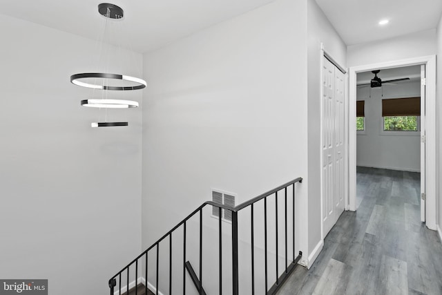 372 Irvington Pl, East Windsor, NJ 08520 - corridor featuring an upstairs landing and wood finished floors