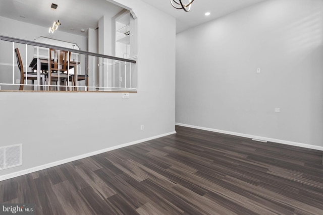372 Irvington Pl, East Windsor, NJ 08520 - spare room featuring a chandelier, wood finished floors, baseboards, and recessed lighting