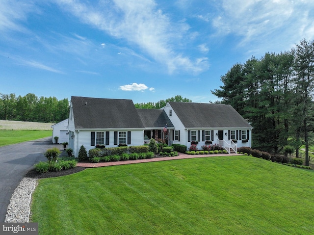 665 Bayard Rd, Lothian, MD 20711 - cape cod home featuring a front lawn, a shingled roof, and a garage