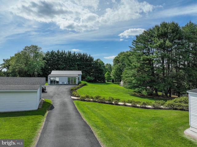 665 Bayard Rd, Lothian, MD 20711 - view of front of home with driveway and a front yard