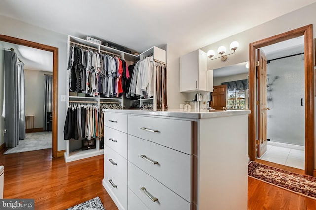 665 Bayard Rd, Lothian, MD 20711 - walk in closet featuring wood finished floors