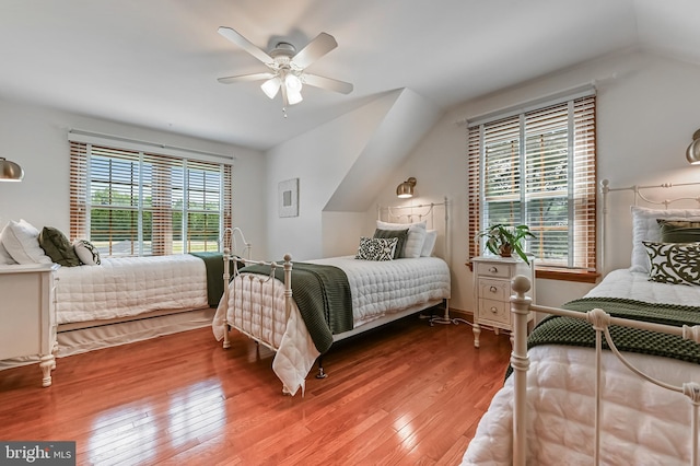 665 Bayard Rd, Lothian, MD 20711 - bedroom featuring wood finished floors, vaulted ceiling, ceiling fan, and baseboards