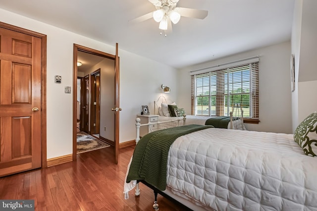 665 Bayard Rd, Lothian, MD 20711 - bedroom featuring wood finished floors, baseboards, and a ceiling fan