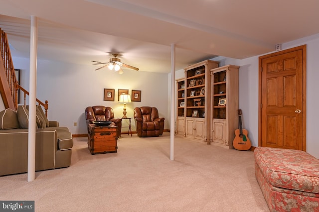 665 Bayard Rd, Lothian, MD 20711 - sitting room with light carpet, a ceiling fan, and stairs