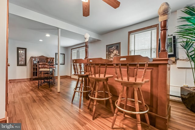 665 Bayard Rd, Lothian, MD 20711 - indoor dry bar with a ceiling fan, wood finished floors, a baseboard heating unit, baseboards, and recessed lighting
