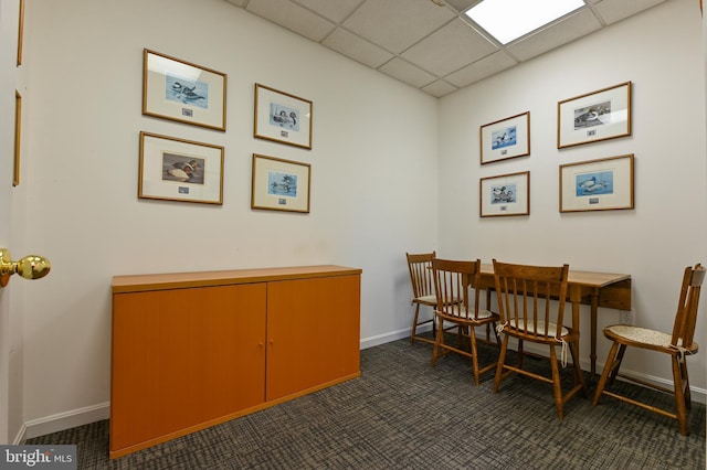 665 Bayard Rd, Lothian, MD 20711 - dining space featuring dark carpet, baseboards, and a paneled ceiling