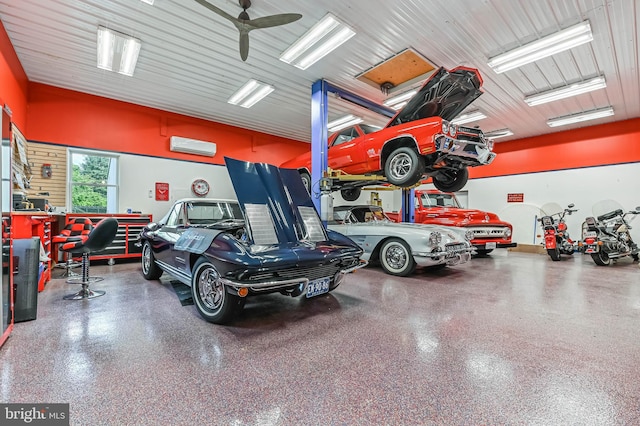 665 Bayard Rd, Lothian, MD 20711 - garage featuring a ceiling fan and a wall mounted air conditioner