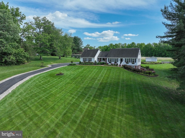 665 Bayard Rd, Lothian, MD 20711 - view of front of home featuring a front yard and a porch