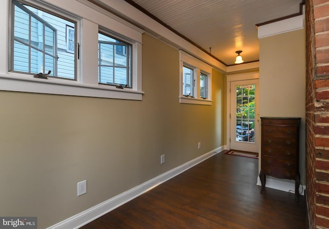 67 N American St, Woodbury, NJ 08096 - unfurnished bedroom with dark wood-style flooring and baseboards