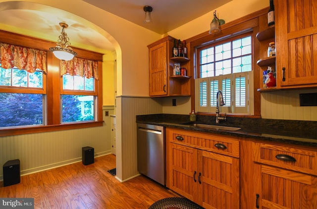 67 N American St, Woodbury, NJ 08096 - kitchen with open shelves, dishwasher, a sink, brown cabinets, and a wainscoted wall