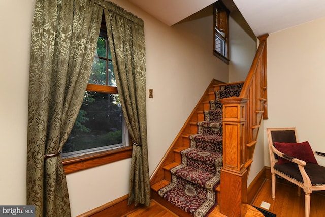 67 N American St, Woodbury, NJ 08096 - staircase featuring wood finished floors and baseboards