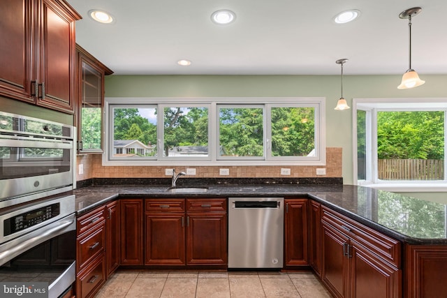 6188 Cobbs Rd, Alexandria, VA 22310 - kitchen featuring appliances with stainless steel finishes, plenty of natural light, hanging light fixtures, and recessed lighting