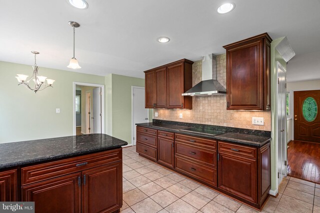 6188 Cobbs Rd, Alexandria, VA 22310 - kitchen featuring wall chimney range hood, black electric stovetop, backsplash, a chandelier, and recessed lighting