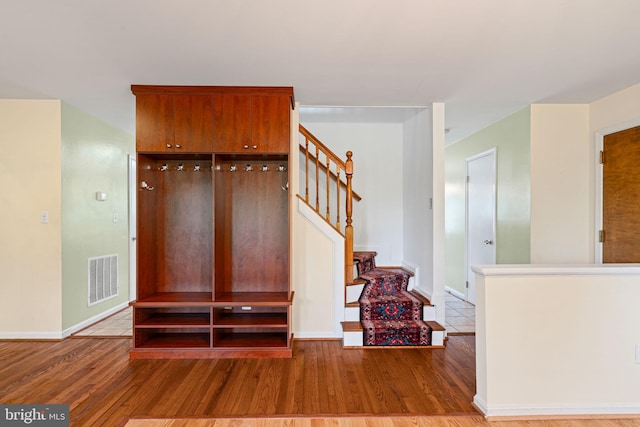 6188 Cobbs Rd, Alexandria, VA 22310 - entryway featuring wood finished floors and stairs