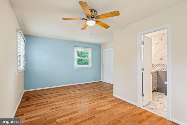 6188 Cobbs Rd, Alexandria, VA 22310 - unfurnished bedroom featuring wood finished floors, ceiling fan, and ensuite bathroom