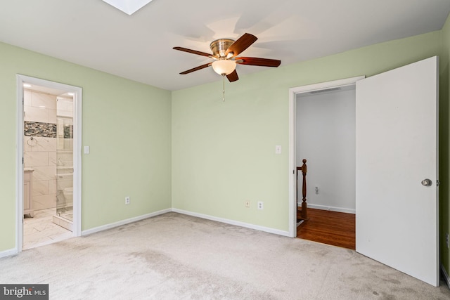 6188 Cobbs Rd, Alexandria, VA 22310 - unfurnished bedroom with carpet flooring, connected bathroom, and a ceiling fan