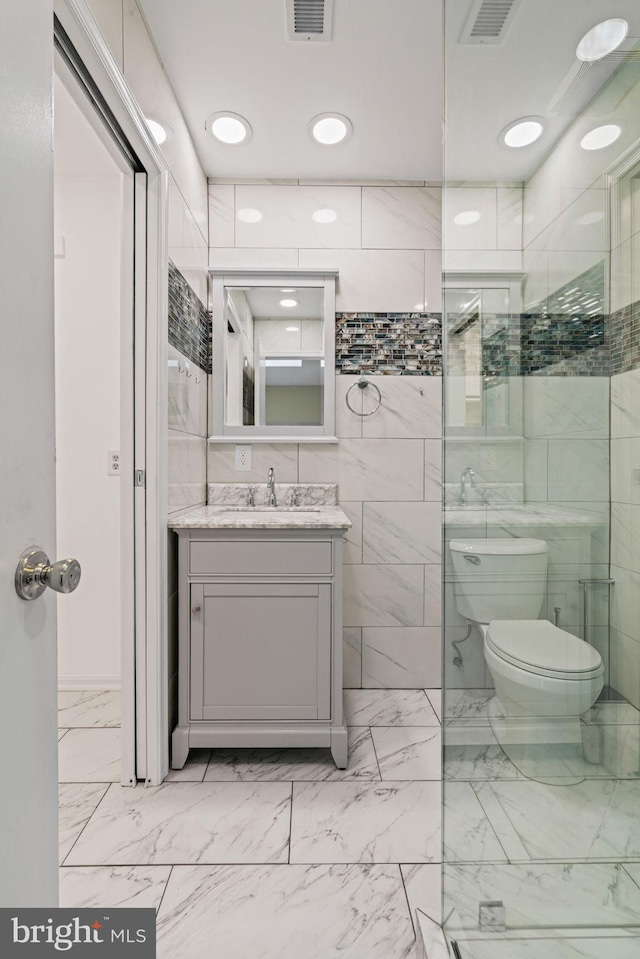 6188 Cobbs Rd, Alexandria, VA 22310 - full bathroom featuring vanity and marble look tile flooring