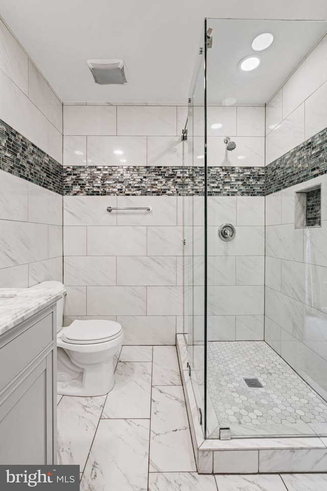 6188 Cobbs Rd, Alexandria, VA 22310 - full bath featuring a stall shower, vanity, and marble finish floors
