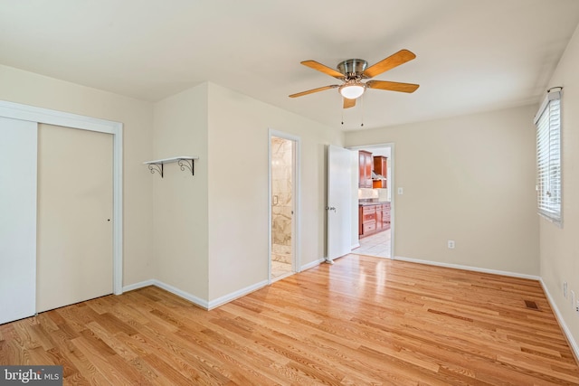 6188 Cobbs Rd, Alexandria, VA 22310 - unfurnished bedroom featuring wood finished floors, a closet, ensuite bath, and ceiling fan
