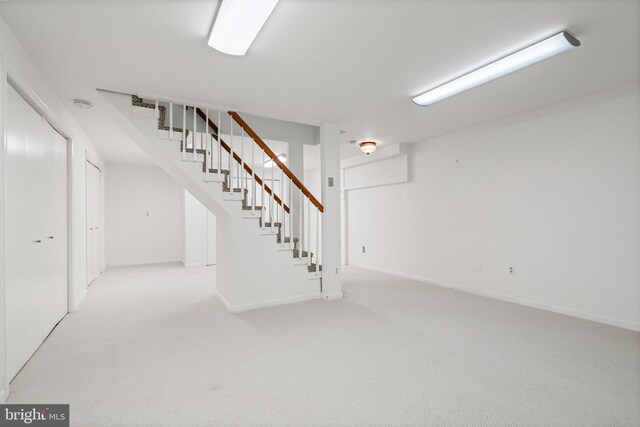 6188 Cobbs Rd, Alexandria, VA 22310 - finished below grade area featuring light carpet and stairway