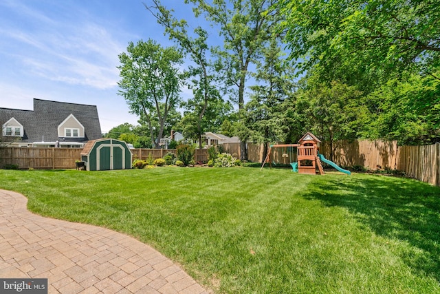 6188 Cobbs Rd, Alexandria, VA 22310 - fenced backyard featuring a storage unit and a playground