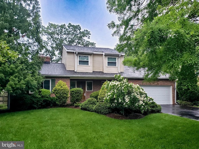 6188 Cobbs Rd, Alexandria, VA 22310 - traditional-style home with asphalt driveway, a front yard, brick siding, and a chimney