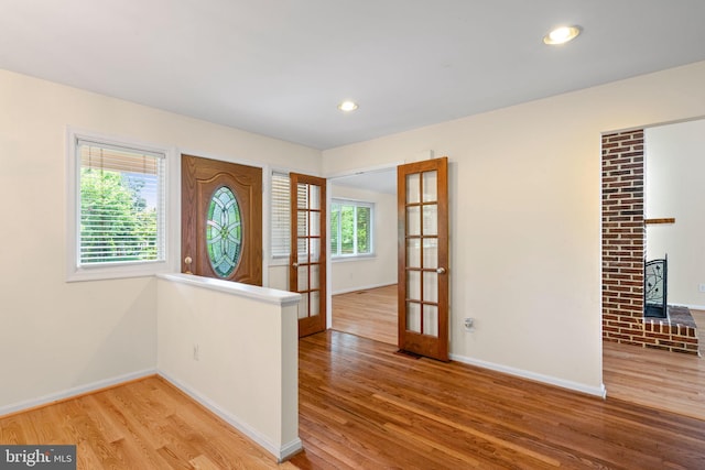 6188 Cobbs Rd, Alexandria, VA 22310 - entrance foyer with wood finished floors, recessed lighting, and french doors