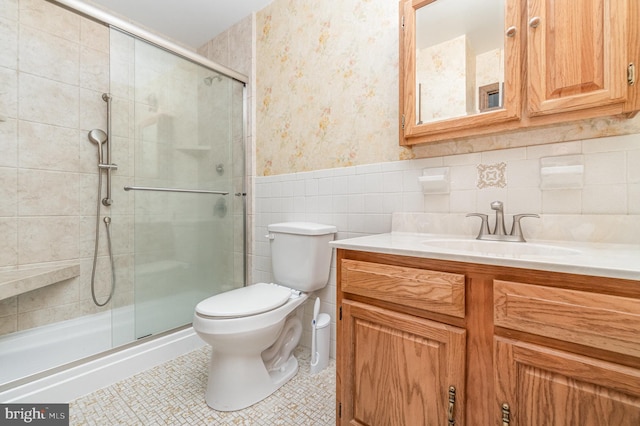 56 Pine Dr, Kirkwood, PA 17536 - full bath featuring toilet, vanity, wallpapered walls, a shower stall, and a wainscoted wall