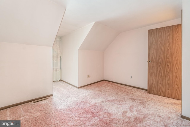 56 Pine Dr, Kirkwood, PA 17536 - additional living space featuring vaulted ceiling, carpet flooring, and baseboards