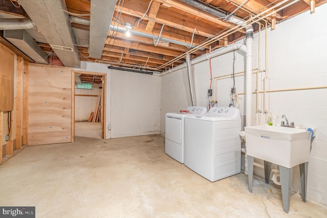 56 Pine Dr, Kirkwood, PA 17536 - unfinished basement featuring washing machine and dryer