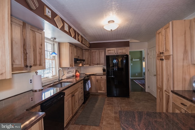 65 White Bark Dr, Middletown, DE 19709 - kitchen with black appliances, under cabinet range hood, a sink, backsplash, and dark stone counters